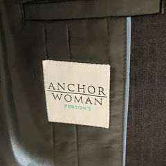 グレーのストライプスーツ　の画像