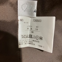 【美品】ブラウンのノーカラースーツの画像