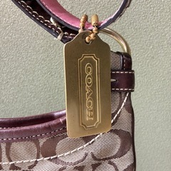 限定プレートキーホルダー付き　コーチのバッグの画像