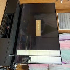 テレビ、テレビ台、DVDプレイヤーの画像