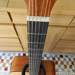 TOP単板のアコースティックギター（ケース付）の画像