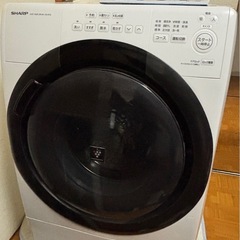 65インチテレビとドラム式洗濯機セットの画像