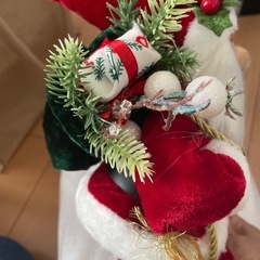 お座りサンタクロースの画像