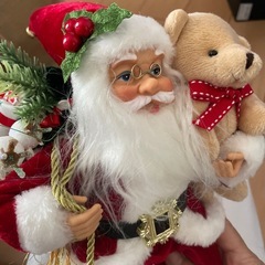 お座りサンタクロースの画像