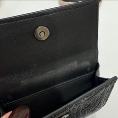 Christian Dior ディオール 三つ折り財布 財布 黒 エンボス ロゴの画像