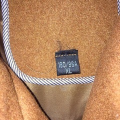 茶色コートの画像