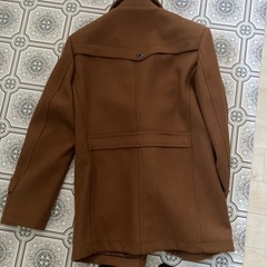 茶色コートの画像