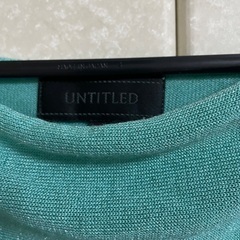 UNTITLED トップスの画像