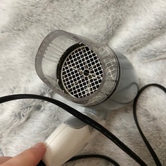 ヘアドライヤー + 丸いブラシの画像