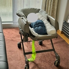 コンビ手動スイングハイローチェアの画像