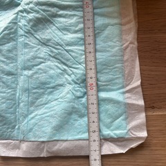 ペット用パットとペット用爪切りの画像