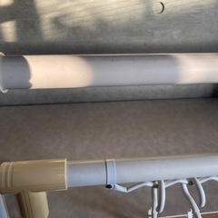 折りたたみ式のX型物干しスタンドの画像