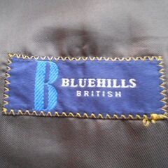 中古　スーツ　こげ茶　無地　厚手ではありません　　Ａ４の画像