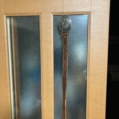 シルバーのバックルと牛革ベルトの画像