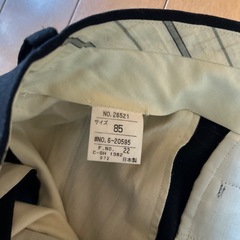 毛100%ブラックスラックスの画像