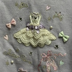 メゾピアノ　紫色のニットの画像