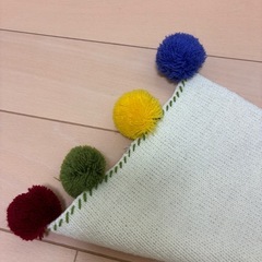 ボンボン付きマフラーの画像