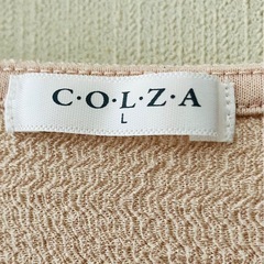 レディース　トップス　薄いピンクの画像