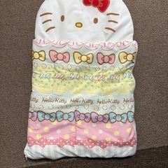 お昼寝布団ともこもこロンパースの画像