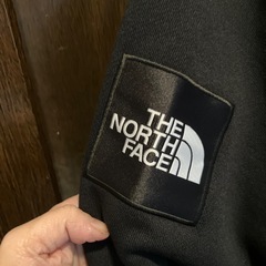 ノースフェイスメンズパーカーの画像