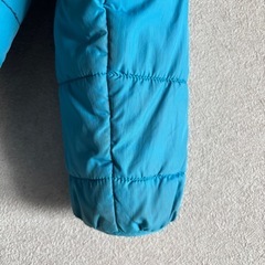 【美品】モンベル Kid's 120 中綿入りフード付きジャケット (ライトブルー)リバーシブルの画像