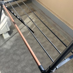 【売ります】ニトリ 物干し(ポール伸縮、木目調)の画像