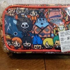 ワンピースのペンケースと扇子の画像