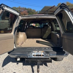 1999y シボレーサバーバン/4WD/V8ボーテックエンジン/5,7L/GMCグリル/ミッキートンプソンの画像