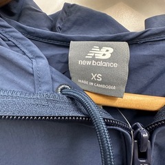 新品・未使用品（タグ付き）New Balance フード付きナイロンジャケットの画像