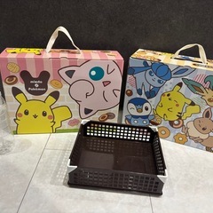 ポケモンの空き箱2つと茶色の入れ物の画像