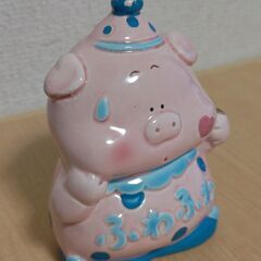 豚さんキャラの貯金箱の画像