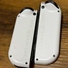 有機ELモデル　任天堂Switch　ガラスフィルム付き　ドック開封済み未使用　付属品付きの画像