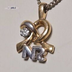Nina Ricci ニナリッチ ネックレス ヴィンテージ 金銀 りぼん 当時の画像