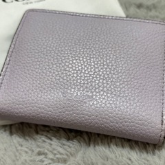COACH コーチ パープル 二つ折り財布 袋付きの画像