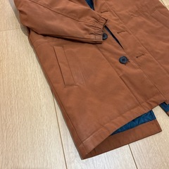 UNIQLOキッズコート120cm（汚れあり）の画像