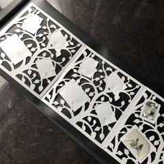 白と黒のツリーモチーフの壁掛けフォトフレームの画像