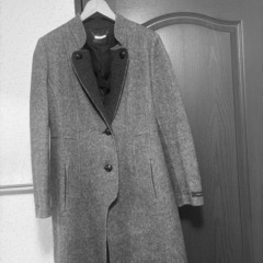 立体感ある女性らしいデザインコートの画像