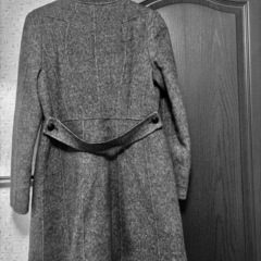 立体感ある女性らしいデザインコートの画像