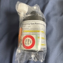 日産　純正　パンク修理キットの画像