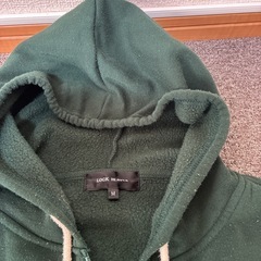 緑のパーカー　男女兼用M　の画像