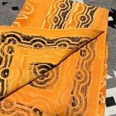 オレンジ 円形模様 マルチカバーの画像