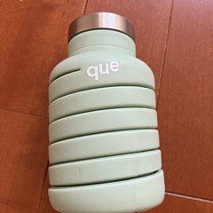 que（キュー）のボトルの画像