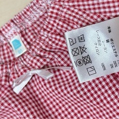 80USED 赤いチェックのトップスの画像