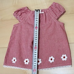 80USED 赤いチェックのトップスの画像