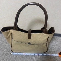 手提げ鞄。幅28cm容量約7Lの画像