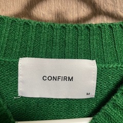 グリーン　ニットの画像