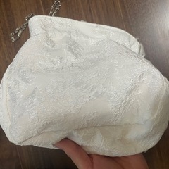 白　巾着バッグ　リボンバッグ　ショルダーバッグの画像