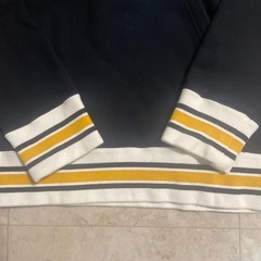 チャンピオンパーカーとニット帽
の画像