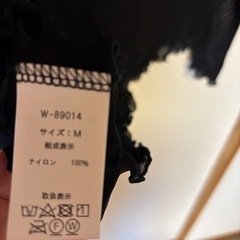 トップス　黒の画像