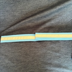 反射タスキ、腕、ホイッスルの画像